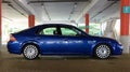 Blue sports car in garage