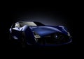 Blue sports car isolated on black background Royalty Free Stock Photo