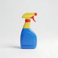 Blue spray bottle with yellow and red trigger and cap, isolated on white Royalty Free Stock Photo