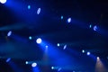 Blue stage lights glowing in the dark Royalty Free Stock Photo