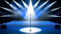 Blue Stage Set with Microphone Under a Bright Spotlight Royalty Free Stock Photo