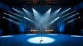Blue Stage Set with Microphone Under a Bright Spotlight Royalty Free Stock Photo