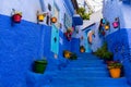 Blue Stairway with colorful potted plants in Chefchaouen Morocco Royalty Free Stock Photo