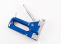 Blue Staple gun isolated over white Royalty Free Stock Photo