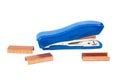 Blue stapler with staples on a white background Royalty Free Stock Photo