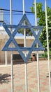 blue star magendavid, symbol of Israel, metal lattice, decoration entrance to the synagogue Royalty Free Stock Photo