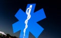 Blue star with Rod of Asclepius as symbol of medicine