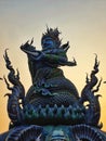 Blue Statue at Rong Sue Ten temple chaing rai in evening