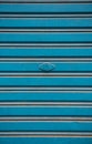 Blue steel door closed and key. Texture pattern and background Royalty Free Stock Photo