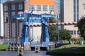 Blue steel drawbridge named Werkspoorhavenbrug at the Keulsekade in Utrecht, the Netherlands