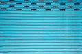 Blue steel sliding door. Shutter texture Royalty Free Stock Photo