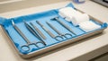 Blue sterile drape. The tools include forceps scissors a scalpel and Royalty Free Stock Photo