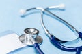 Blue stethoscope medical equipment close-up