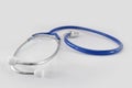 Blue stethoscope medical tool isolated on white background. Royalty Free Stock Photo