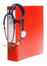 Blue stethoscope and red binder isolated on white Royalty Free Stock Photo