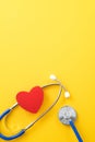 Blue stethoscope with red heart, medical care design concept Royalty Free Stock Photo