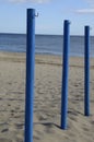 Blue sticks on beach