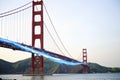 Blue streak of light passing by Golden Gate Bridge against clear sky Royalty Free Stock Photo