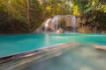 Blue stream waterfall locate in Erawan Nation Park Royalty Free Stock Photo
