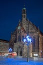 Blue street lights in front of the Frauenkirche in Nuremberg. The blue night 2023