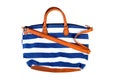Blue striped beach bag isolated on white Royalty Free Stock Photo