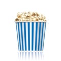 Blue striped popcorn bucket isolated on white background.