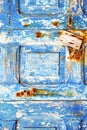 Blue stripped paint in rusty nail