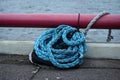 Blue strong shipping boat rope for big ship docking Royalty Free Stock Photo