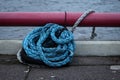 Blue strong shipping boat rope for big ship docking Royalty Free Stock Photo