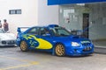 Blue Subaru Impreza WRX STI Blobeye in gas station Royalty Free Stock Photo