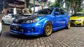 Blue Subaru WRX STI in a car meet Royalty Free Stock Photo