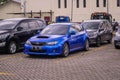 Blue Subaru WRX STI hatchback in a parking lot Royalty Free Stock Photo