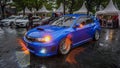 Blue Subaru WRX STI on parking lot Royalty Free Stock Photo