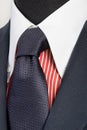 Blue suit with tie and red striped shirt Royalty Free Stock Photo