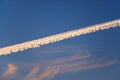 Blue sky with clouds and vapour trail as a background