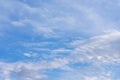 Blue summer sky with a lot of white cirrus clouds. Natural Royalty Free Stock Photo