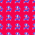Blue Sunbed icon isolated seamless pattern on red background. Beach umbrella and Sun lounger. Vector Royalty Free Stock Photo