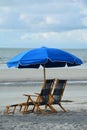 Blue sunbed for two with sunshade at Coligny beach of Hilton Head Island, South Carolina