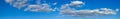 Blue sunny sky with white clouds landscape banner Royalty Free Stock Photo