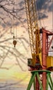 Blue sunset sky after five big high cranes under a new construction site of high-rise building against blue sunset sky Royalty Free Stock Photo