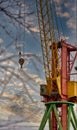 Blue sunset sky after five big high cranes under a new construction site of high-rise building against blue sunset sky Royalty Free Stock Photo