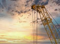 Blue sunset sky after five big high cranes under a new construction site of high-rise building against blue sunset sky Royalty Free Stock Photo