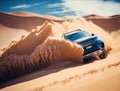 A blue SUV on a clear sunny day rushes through the dunes