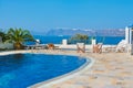 Blue swimming pool in Fira, Santorini, Greece. Royalty Free Stock Photo