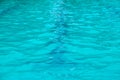 Blue swimming pool rippled water