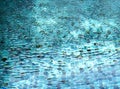 Blue swimming pool rippled water detail Royalty Free Stock Photo