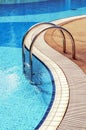 Blue swimming pool with steps