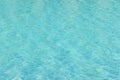 Blue swimming pool water texture reflecting the sun rippled Royalty Free Stock Photo