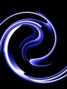 Blue fluorescent swirl pattern on black background