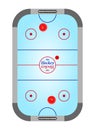 Blue table air hockey with rinks and gray with black counters of on the wicket blue hockey surface and the red and blue lines on a